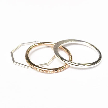 Minimalist gold stacker ring with hammered texture