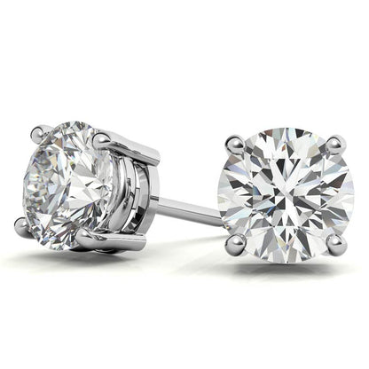 A pair of 14k white gold round brilliant-cut lab-grown diamond stud earrings with push-back closures.