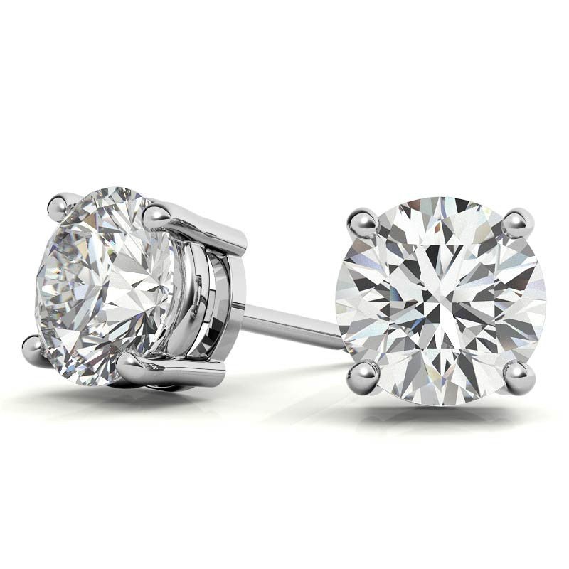 Pair of 2 carat lab grownd diamond stud earrings on a white background