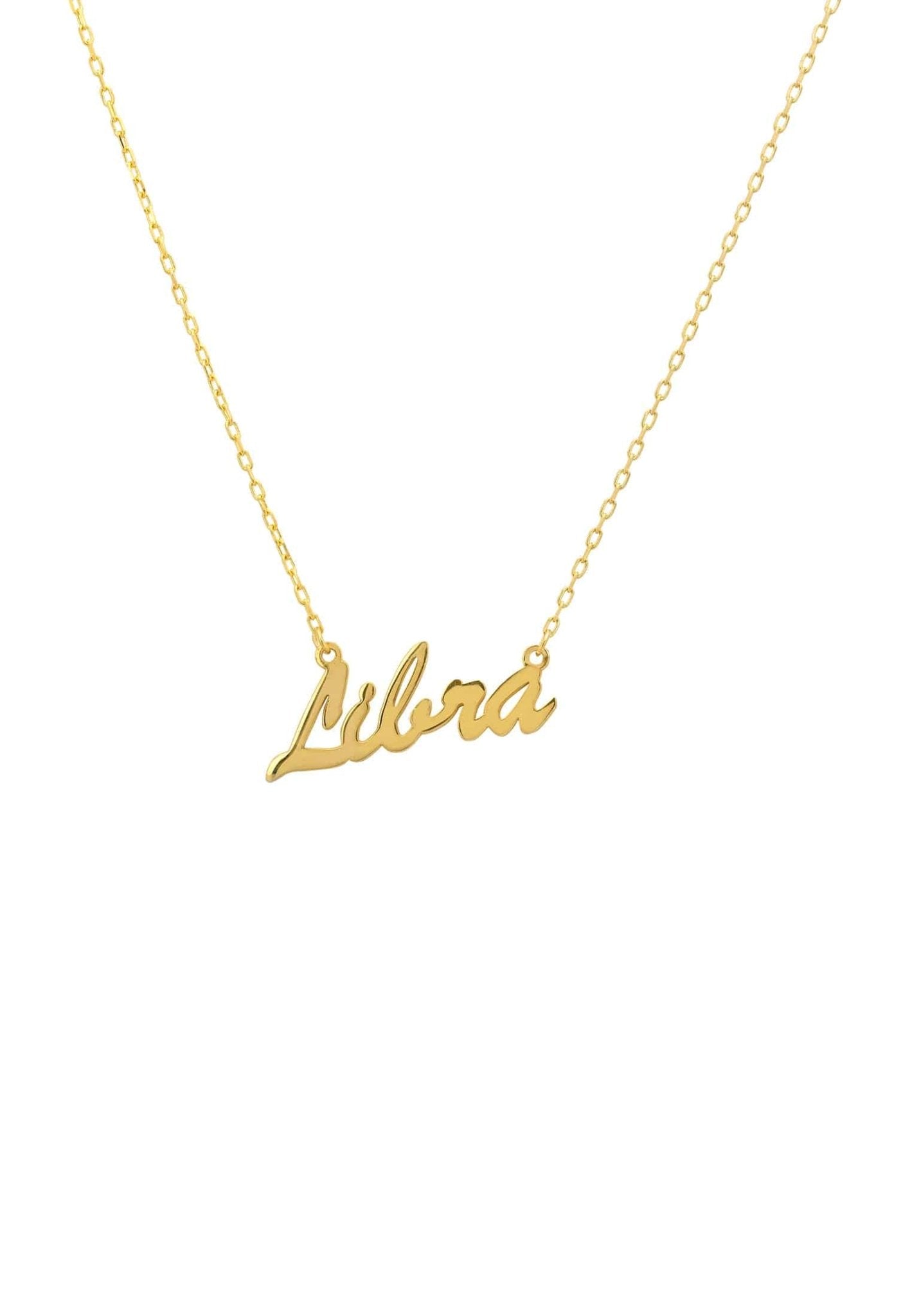 Libra zodiac necklace in gold on a jewelry box