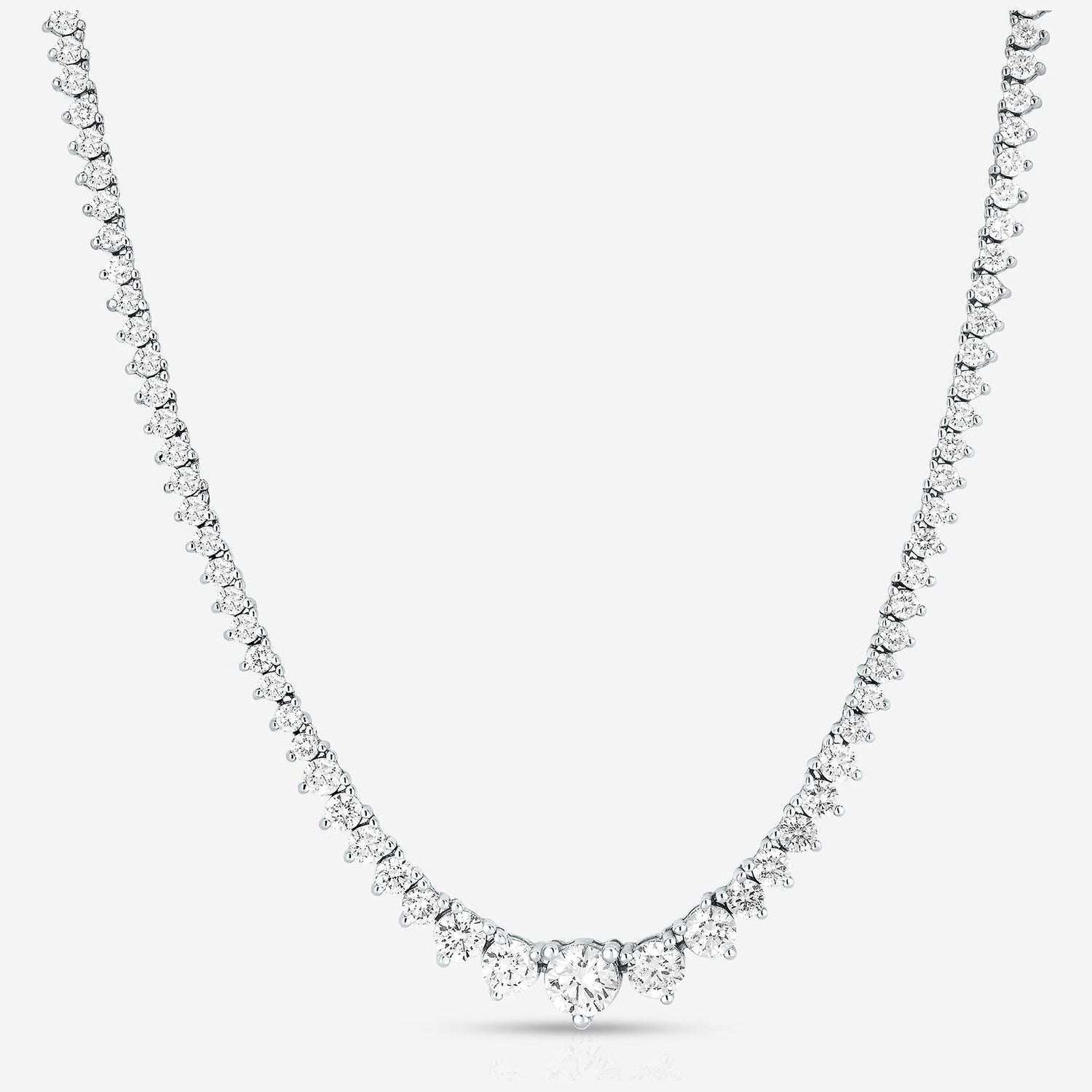 Diamond necklace on a light gray background