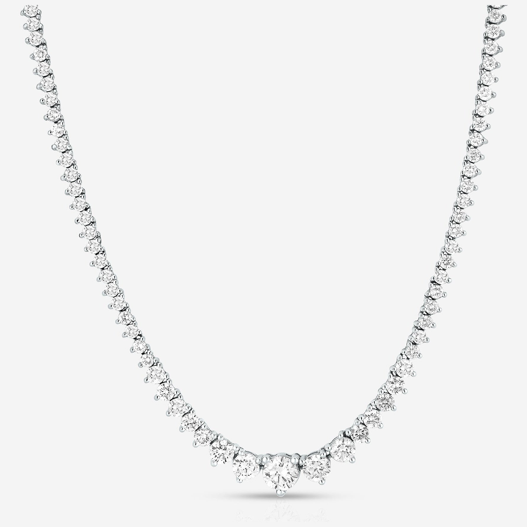 Diamond necklace on a light gray background