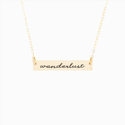 Wanderlust necklace in gold bar design