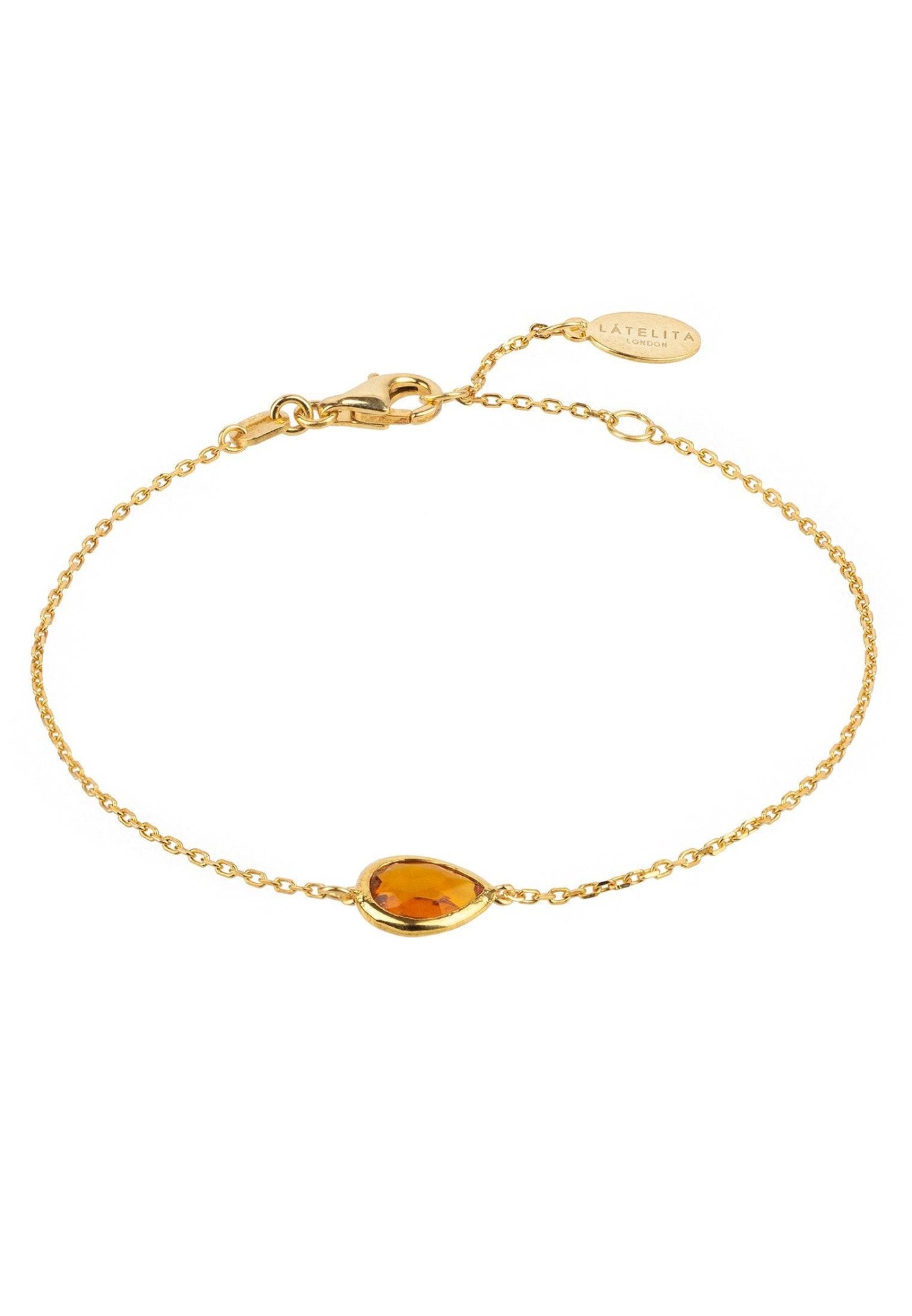 Gold citrine teardrop bracelet on wrist