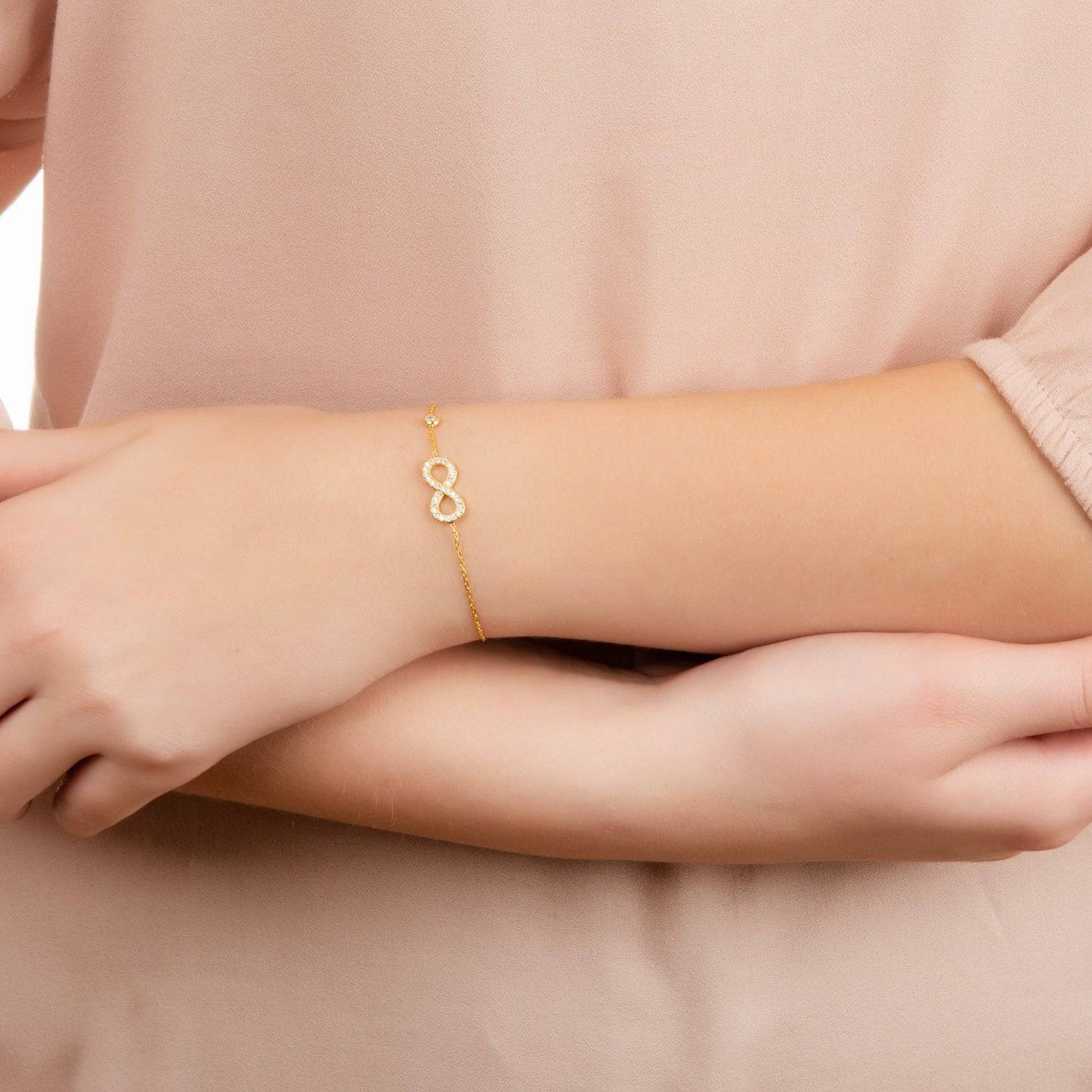 Sterling Silver Infinity Symbol Bracelet in Gold