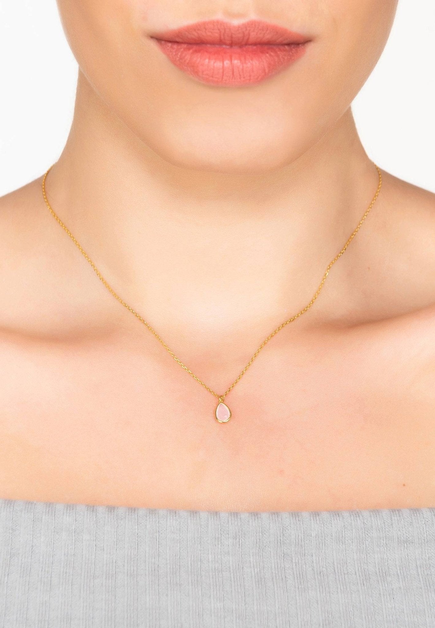 Gold teardrop necklace with rose quartz gemstone