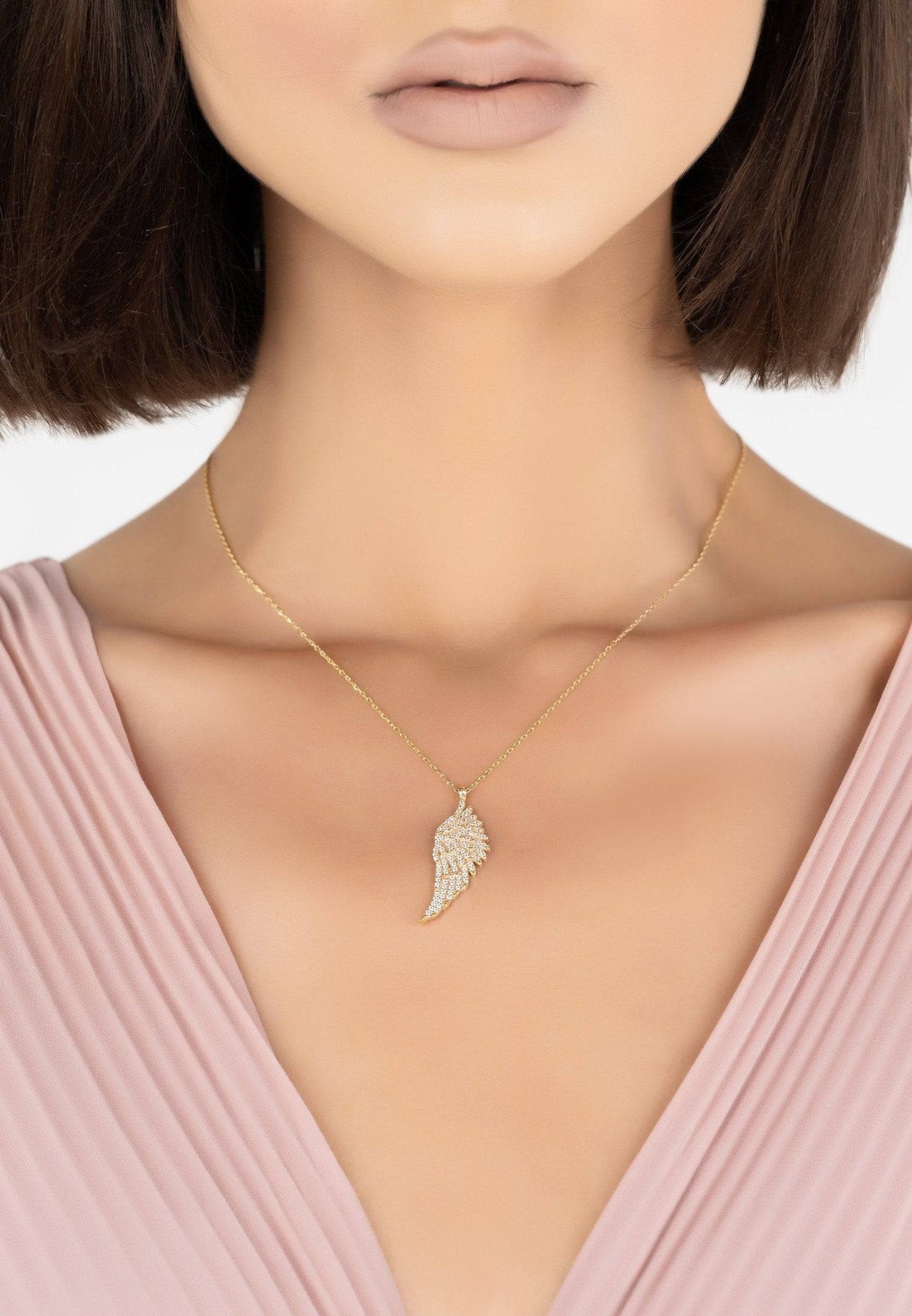 Elegant Angel Wing Jewelry in Gold